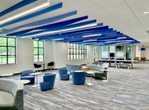 Modern linear lighting installed in a commercial office space by Onsite Electrical Services in Raleigh, NC.