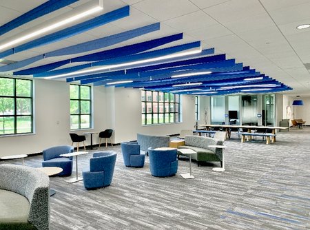 Modern linear lighting installed in a commercial office space by Onsite Electrical Services in Raleigh, NC.