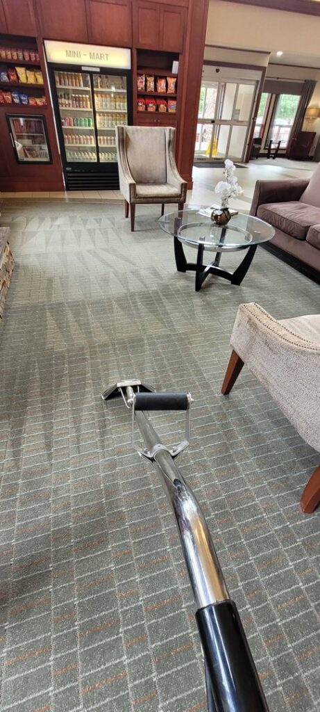 Carpet cleaning in a commercial lobby with a cleaning wand by PDX STAR in Happy Valley, OR