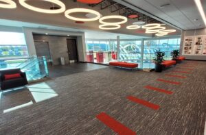 A spacious commercial lobby featuring new patterned carpet installation by The Carpet Shoppe in Springfield, MO.