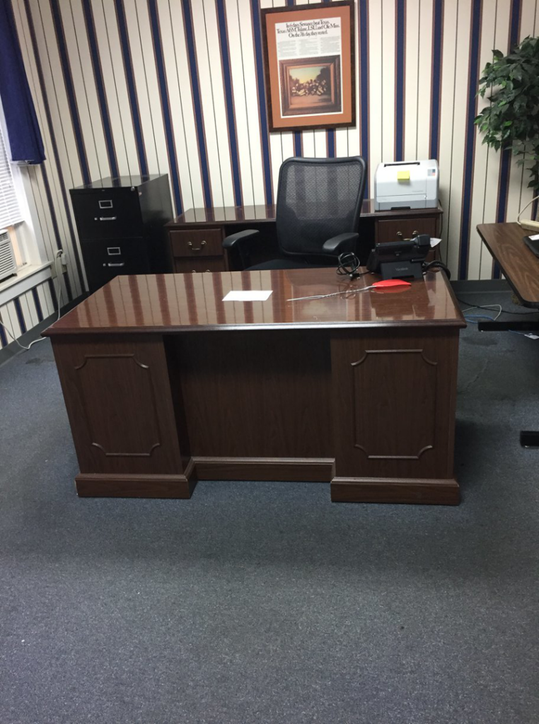 A commercial office space featuring a blue carpet installation by Tony Trujillo Flooring Sales & Installation in Franklin, TN.