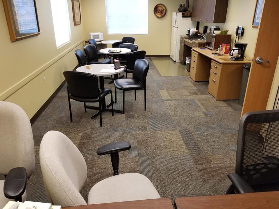 A commercial office space with newly installed carpet tiles by Bozeman Flooring in Bozeman, MT.