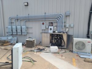 Commercial outdoor electrical panels, conduits, and wiring installed by Red Earth Electric LLC in Oklahoma City, OK.