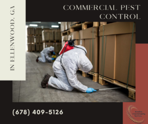 Technicians performing commercial pest control in a warehouse for Absolute Exterminating Services in Ellenwood, GA.