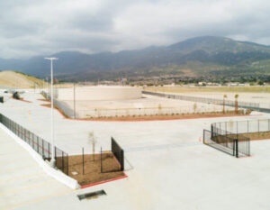 Multiple black metal fences and gates installed around a commercial property by Competitive Fence Contractors LLC in Scottsdale, AZ.