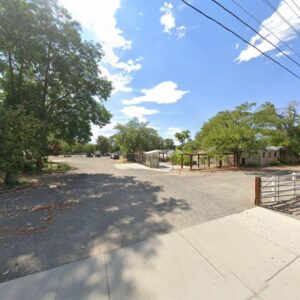 Extensive commercial property fencing and a large gate installed by All Out Companies, LLC. in Fernley, NV.