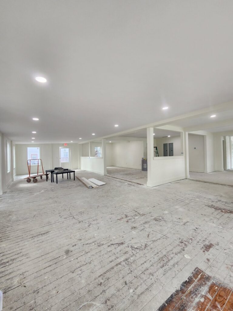 A large commercial space with numerous recessed lights installed in the ceiling by ALC Electric LLC in Goose Creek, SC