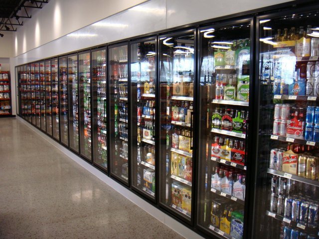 A long row of commercial refrigeration display units installed by Benck Mechanical Inc in Somerset, WI.