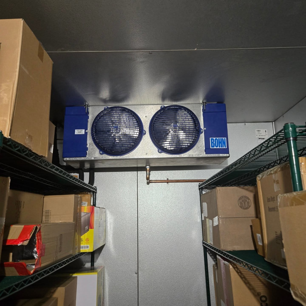 A commercial refrigeration unit inside a walk-in cooler serviced by Pepeta Service Inc. in Clayton, DE