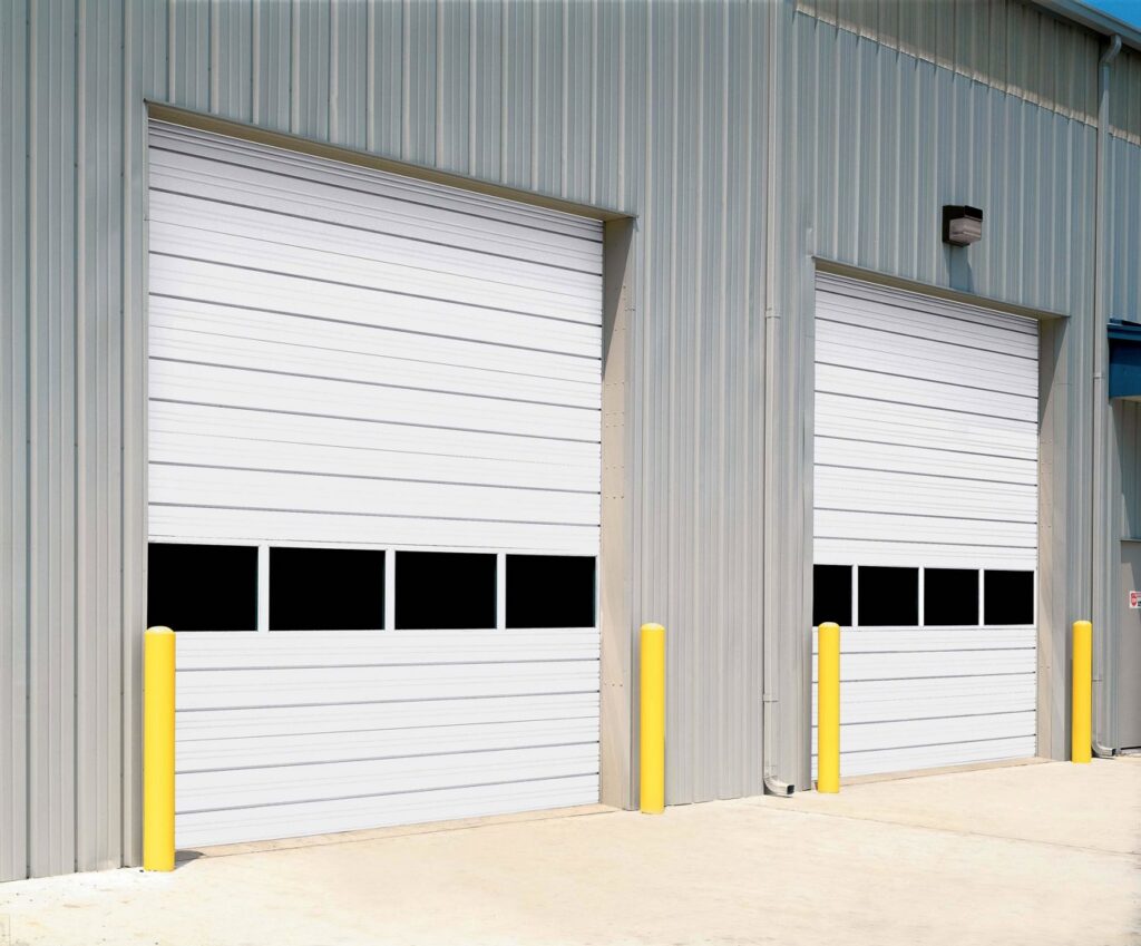 Commercial roll-up garage doors installed on a metal building by Overhead Door Company of Salem in Salem, OR.