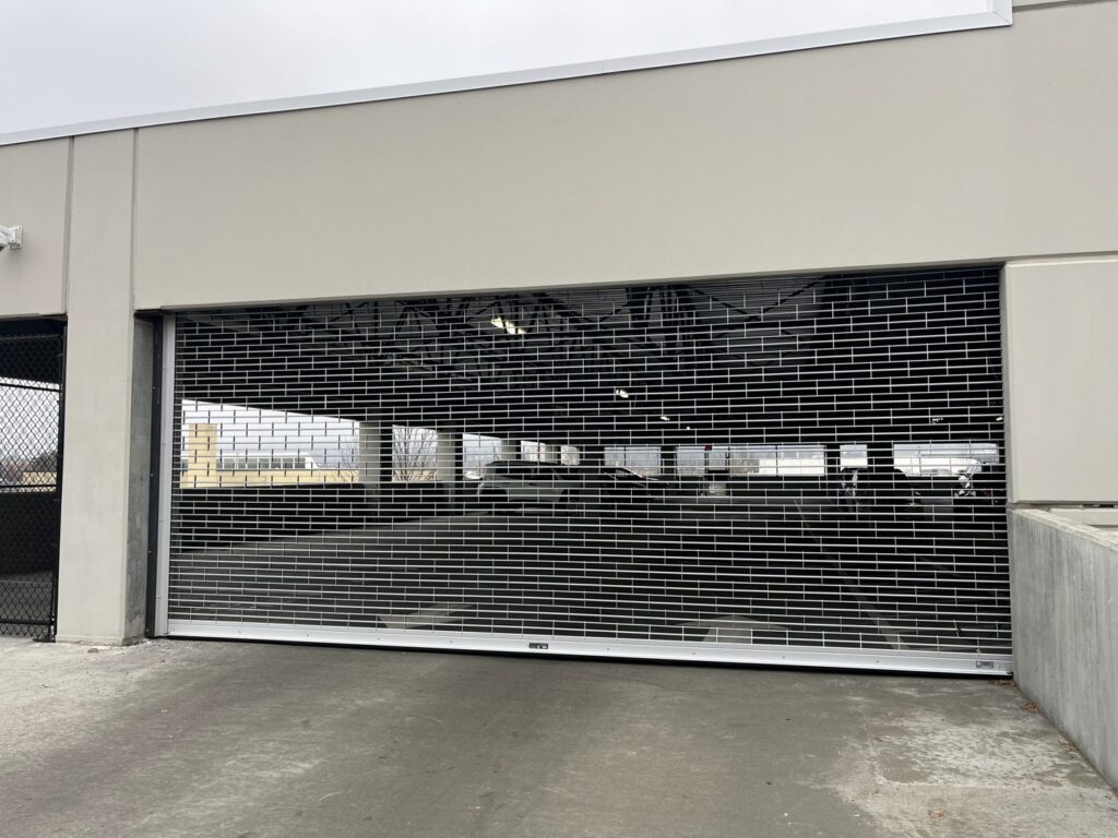 A large commercial rolling security grille installed by Remarkable Door Company in Spokane, WA.