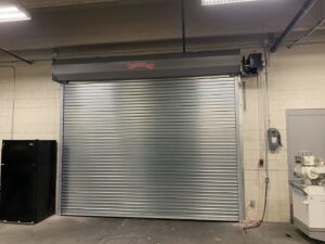 A large commercial rolling steel garage door installed by Overhead Door Company of Maricopa & Pinal County in Mesa, AZ.