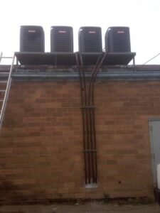 Multiple commercial rooftop air conditioning units installed by All Systems LLC in Fremont, NE