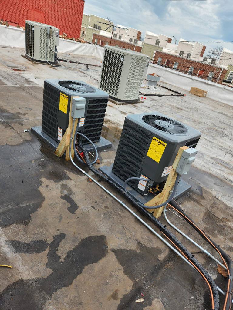 Multiple commercial rooftop air conditioning units installed by Total HVAC - Heating and Cooling in Nashville, TN.