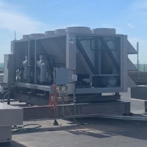 A large commercial rooftop chiller unit installed by Schomp's Mechanical Services in Brookings, SD.