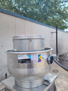 A commercial rooftop exhaust fan installed by BW Refrigeration LLC in Lawrence, KS.
