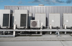 Multiple commercial rooftop HVAC systems installed and maintained by Accurate Air Inc. in Manchester, NH.