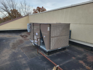 A commercial rooftop HVAC unit installed by ESR Heating, Cooling and Refrigeration in Raymore, MO.