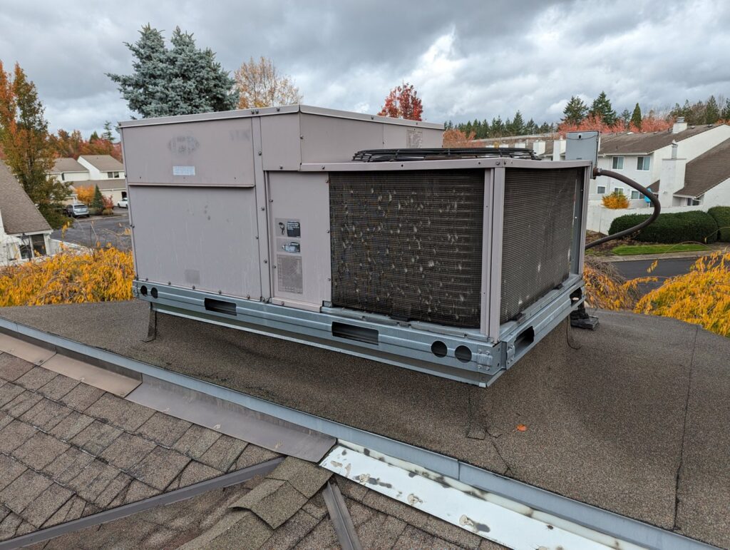 A large commercial rooftop HVAC unit installed by Gresham Heating and Air Conditioning in Wood Village, OR.
