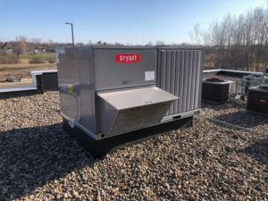 Commercial rooftop HVAC unit installation by Breyer's Heating & Air Conditioning in Belleville, MI
