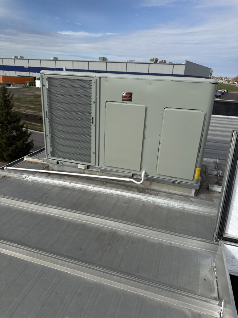 A large commercial rooftop HVAC unit installed by Erman Mechanical in Fort Wayne, IN
