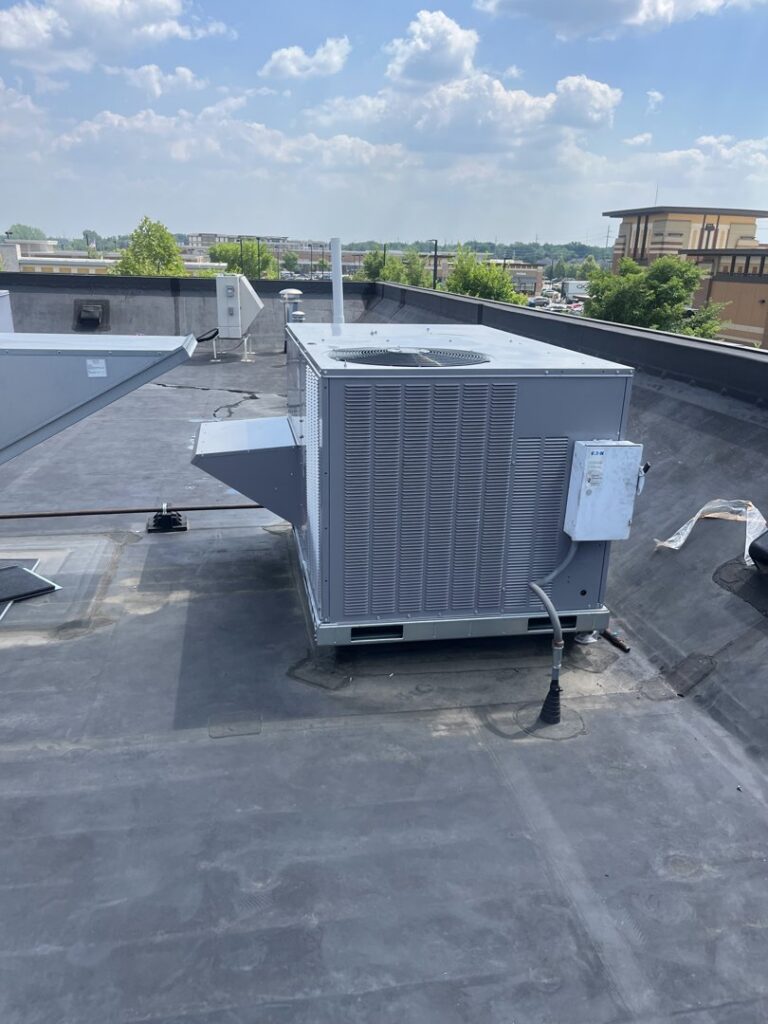 A large commercial rooftop HVAC unit installed on a building, demonstrating services by Jons-Air in Carmel, IN.