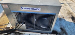 A commercial rooftop HVAC unit, potentially installed or maintained by Nelke Mechanical in Keizer, OR.