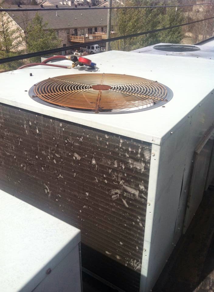 A large commercial rooftop HVAC unit, showing equipment maintained by Johnson's Heating and Cooling in Clarksville, TN.
