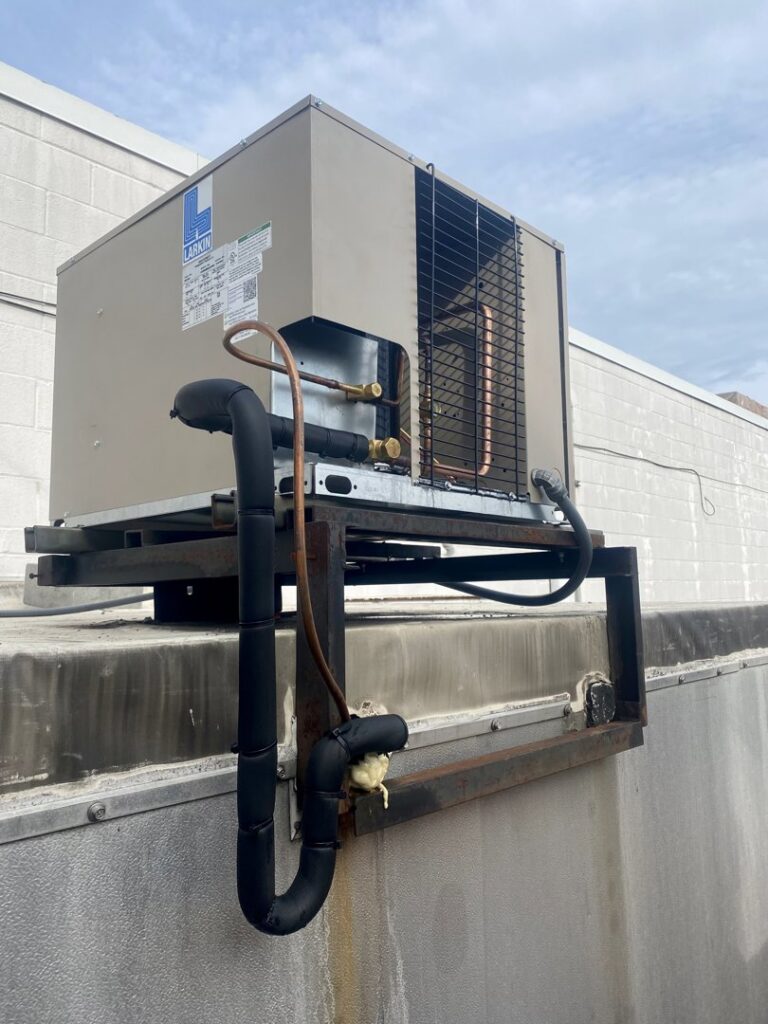 A commercial Larkin rooftop HVAC unit installed on a building by Grozier Heating and Air Conditioning, LLC in Allentown, PA.