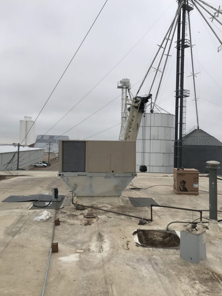 A large commercial rooftop HVAC unit on a building, maintained by A-1 Heating and Air Conditioning Service in Alexandria, VA