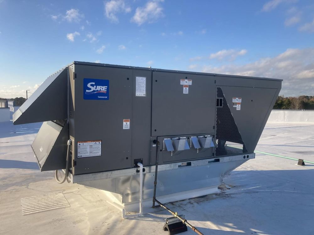 A large commercial rooftop HVAC unit installed by Oakes AC Services, LLC in Louisburg, NC