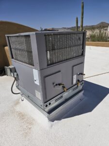 A large commercial rooftop HVAC unit installed by Quantum Cooling & Heating, serving businesses in Mesa, AZ.