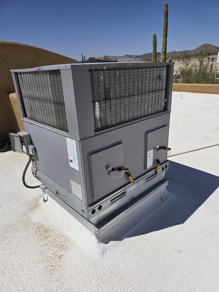 A large commercial rooftop HVAC unit installed by Quantum Cooling & Heating, serving businesses in Mesa, AZ.