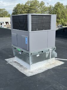 A newly installed commercial rooftop HVAC unit by Southern Comfort Heating/Cooling/Gas in Fayetteville, NC.