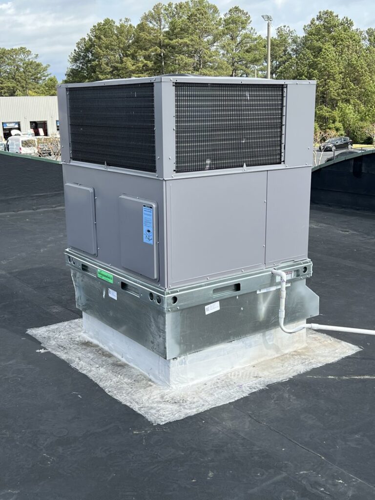 A newly installed commercial rooftop HVAC unit by Southern Comfort Heating/Cooling/Gas in Fayetteville, NC.