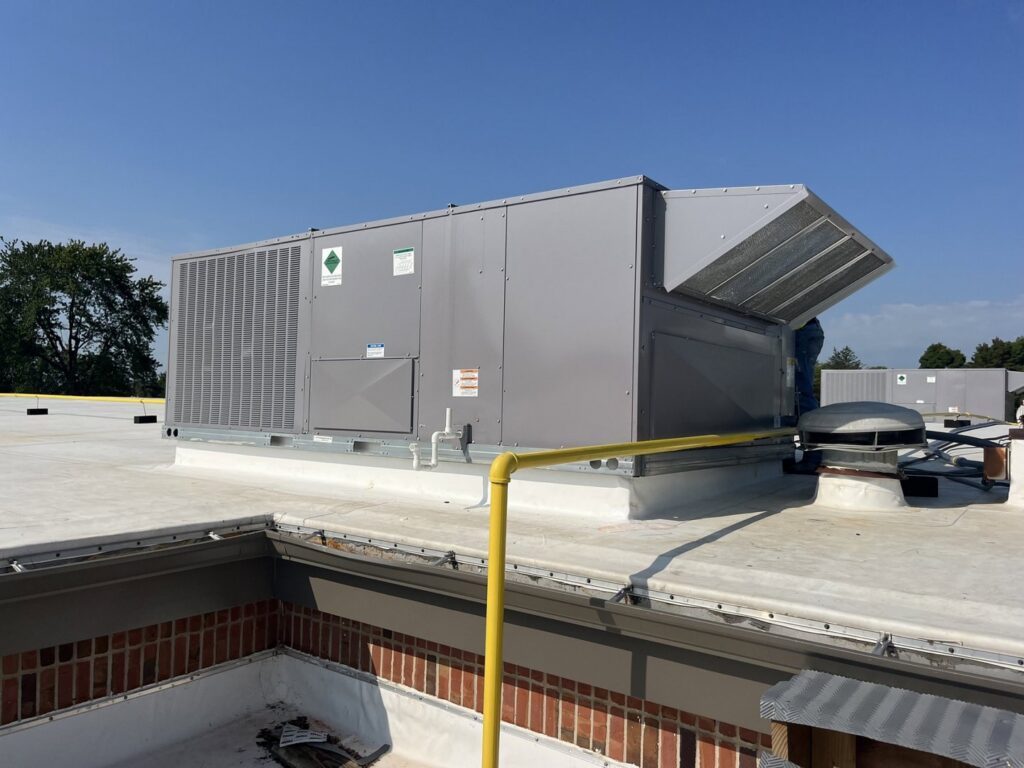 A large commercial rooftop HVAC unit installed by STAR Heating Cooling Plumbing in Fishers, IN.