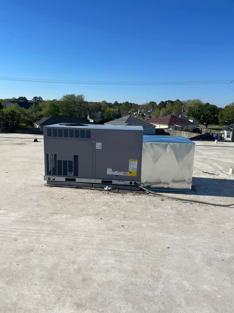 A large commercial rooftop HVAC unit with new ductwork installed by Wicked Cool HVAC in Charleston, SC.