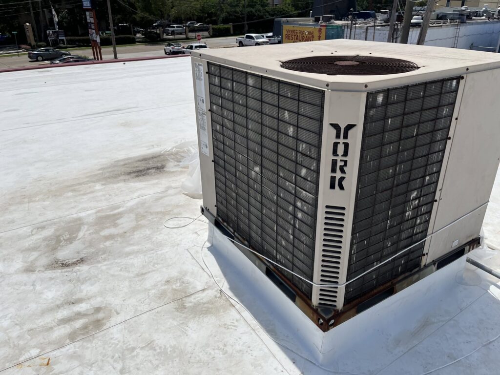 A large commercial rooftop HVAC unit by York, indicating commercial HVAC services by Keith HVAC & Electrical Enterprises LLC in New Orleans, LA.