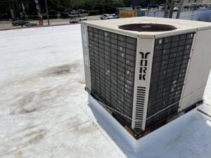 A large commercial rooftop HVAC unit by York, indicating commercial HVAC services by Keith HVAC & Electrical Enterprises LLC in New Orleans, LA.
