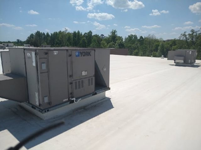 A commercial rooftop HVAC unit by YORK, maintained by SBS-NC, LLC in High Point, NC.