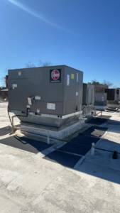 Multiple commercial rooftop HVAC units installed by Affordable heating and air conditioning in Meridian, MS.