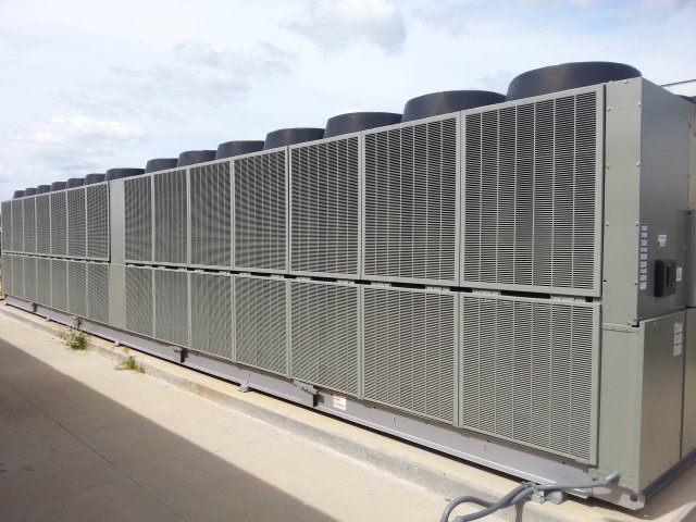 Large commercial rooftop HVAC units, representing services by DFH Company Heating and Air Conditioning in Louisville, KY
