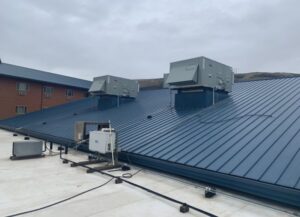 Multiple commercial rooftop HVAC units installed on a building by AP HVAC in Ridgewood, NY.
