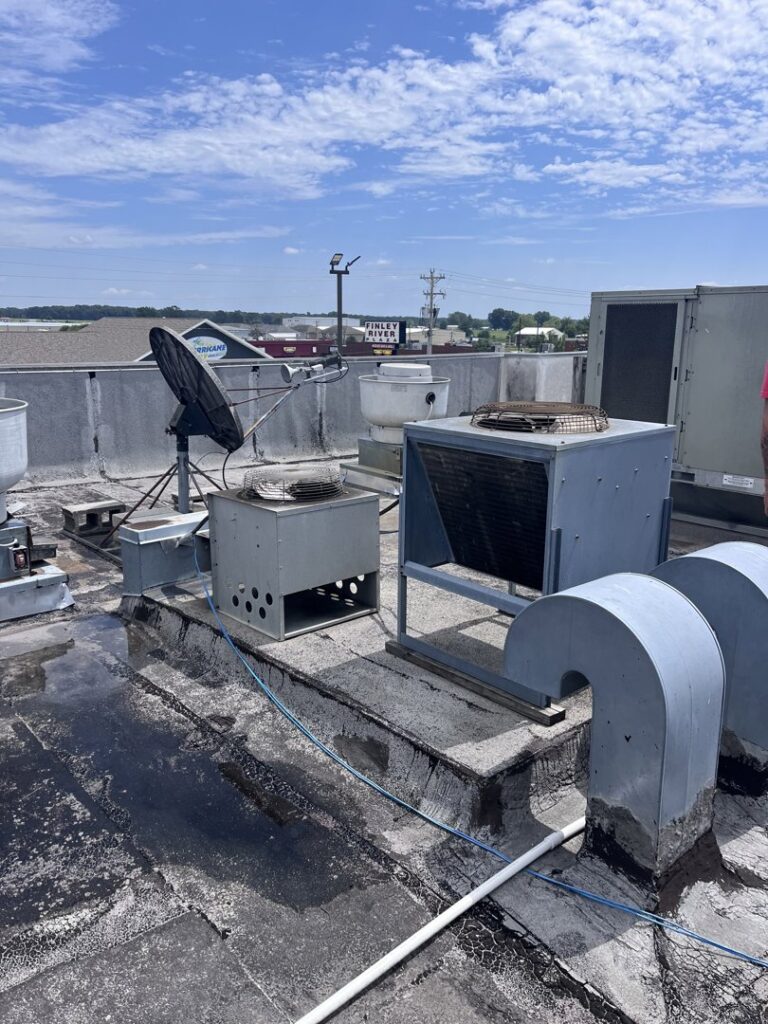 Multiple commercial rooftop HVAC units maintained by Springfield HVAC Company in Springfield, MO.