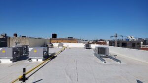 Multiple commercial rooftop HVAC units installed by Synergy3, an HVAC contractor in Philadelphia, PA.