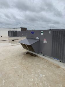 Multiple commercial rooftop HVAC units, showcasing installations by U.S. HVAC Services in Madison, AL.
