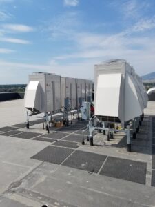 Large commercial LG HVAC units installed on a rooftop by ABT Heating and Cooling in Orem, UT.