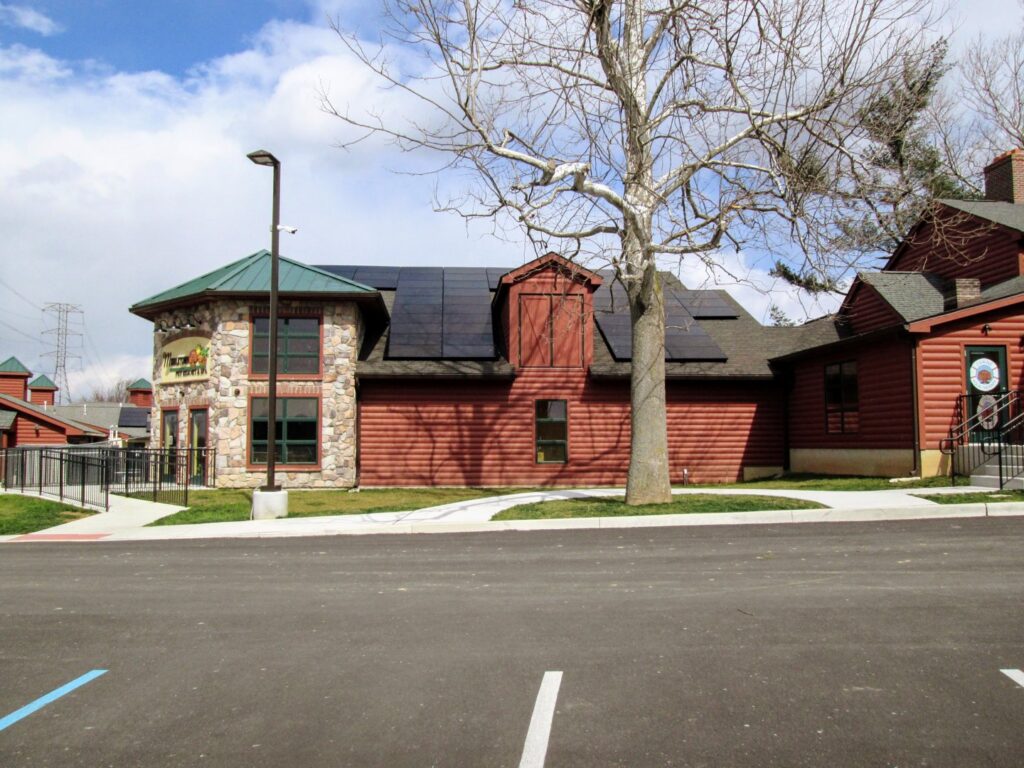 Commercial solar panel installation on a building by CMI Solar & Electric, Inc. in Newark, DE.