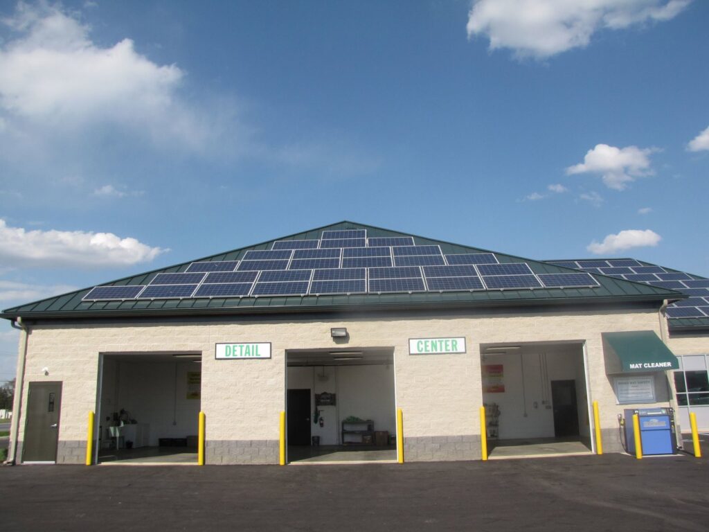 Commercial solar panel installation on a car wash building by CMI Solar & Electric, Inc. in Newark, DE.
