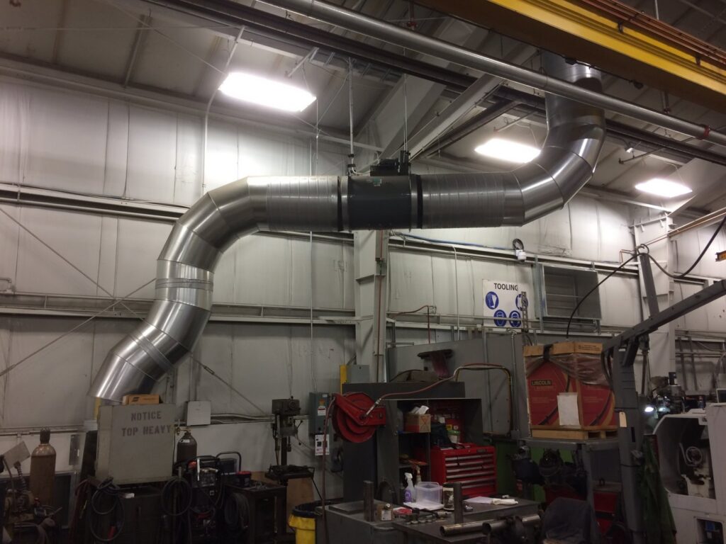 Newly installed commercial spiral ductwork in a large facility by Montefusco HVAC in Peoria, IL